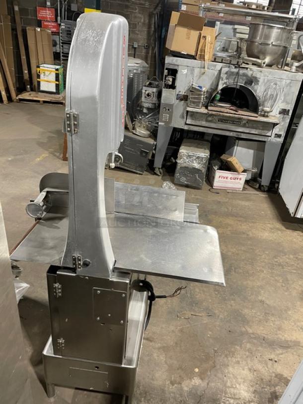 Butcher Boy stainless steel electric meat band saw, heavy-duty, free-standing on legs, excellent condition.