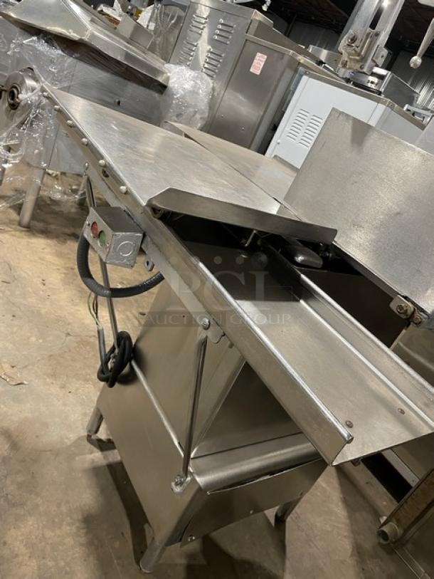 Butcher Boy stainless steel electric meat band saw, heavy-duty, free-standing on legs, with control panel, good condition.