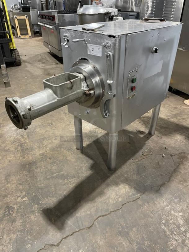 Hobart commercial meat grinder, electric-powered, freestanding, heavy-duty, on legs. Used condition with visible controls.