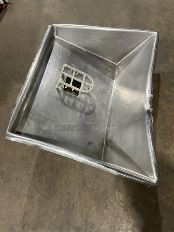 Hobart commercial electric meat grinder, heavy-duty, free-standing on legs, features a sturdy metal construction, used condition.