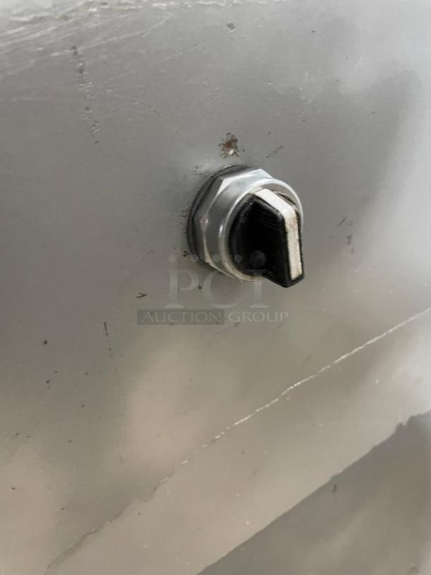 Hobart commercial electric meat grinder, heavy-duty, free-standing, on legs, metal finish, visible switch detail.