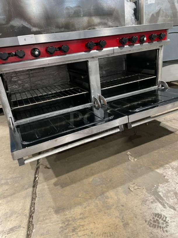 Vulcan commercial 10-burner stainless steel range with double ovens, backsplash, overhead salamander shelf, and wired racks.