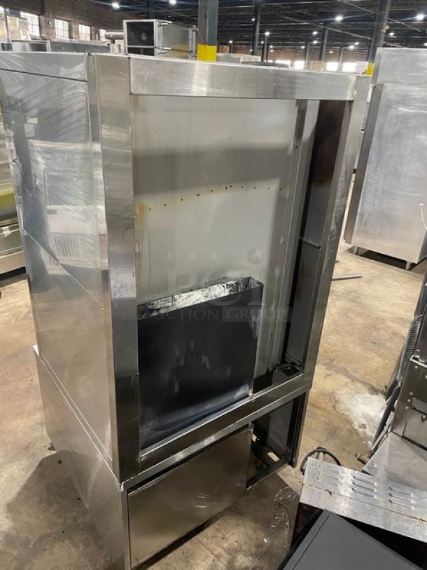 Commercial stainless steel seafood steamer cabinet, 3 compartments, natural gas, individual controls, wired oven rack, on legs.