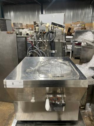 Commercial stainless steel ice cream machine, model ICM-12, electric powered, countertop, single-flavor, 110V, excellent condition.