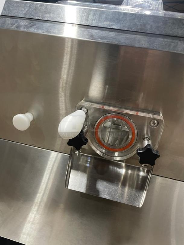 Stainless steel countertop ice cream machine, model ICM12, single-flavor, electric, 110V, excellent condition.