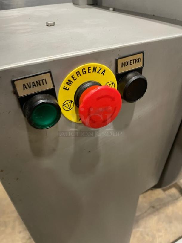 Tre Spade/Omcan MX-50 meat mixer control panel with emergency stop and directional buttons.