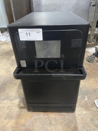 MerryChef Eikon E2S black commercial high-speed rapid cook oven, electric powered, countertop model, 208/240V 1 phase.