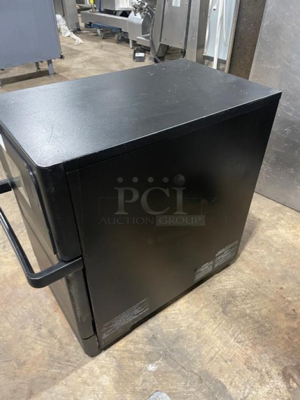 MerryChef Eikon E2S black countertop rapid cook oven, 208/240V, used condition, visible labels on the side.