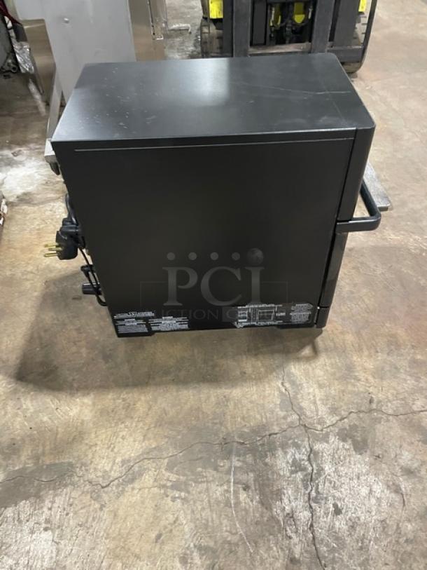 MerryChef Eikon E2S black electric countertop rapid cook oven in good condition, 208/240V, visible side panel labels.