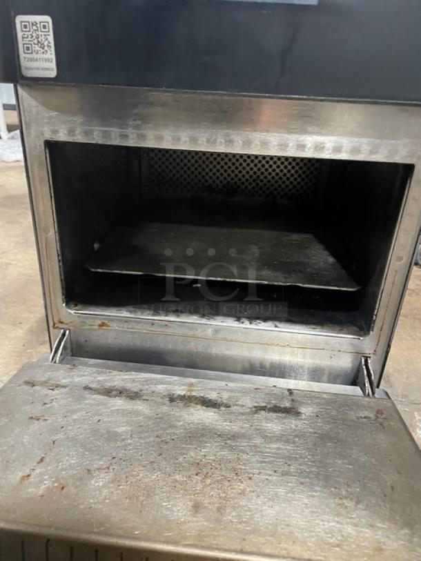 MerryChef Eikon E2S high-speed countertop oven, electric, black, used condition, visible tray and interior markings, model Eikon E2S.
