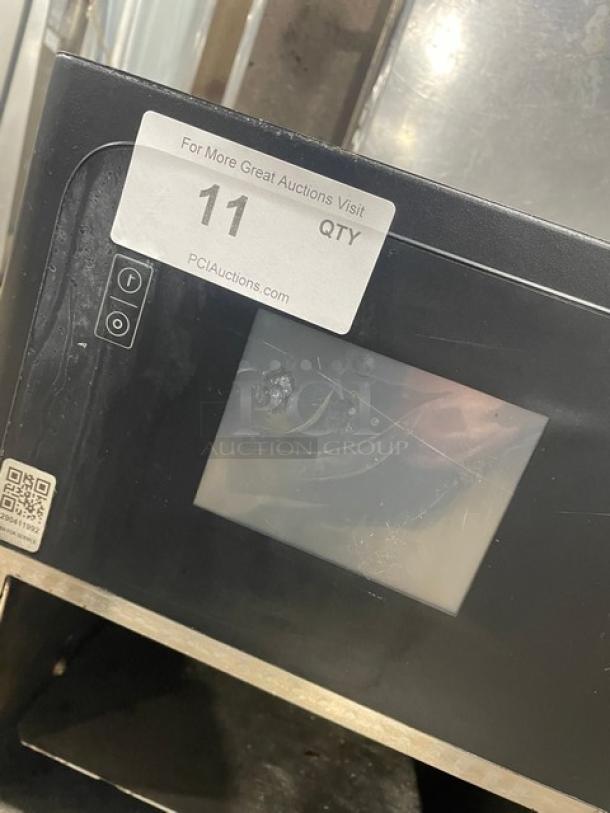 MerryChef Eikon E2S black countertop high-speed oven, electric, 208/240V, 1-phase, minor wear, auction tag visible.