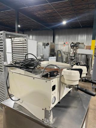 Synesso S200 Series white two-group espresso machine with steam wand, electric-powered, countertop design.