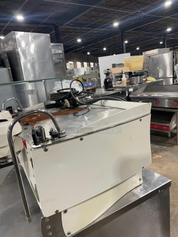 Synesso S200 white two-group espresso machine with steam wand, electric powered, countertop model. Visible wear on top panel.