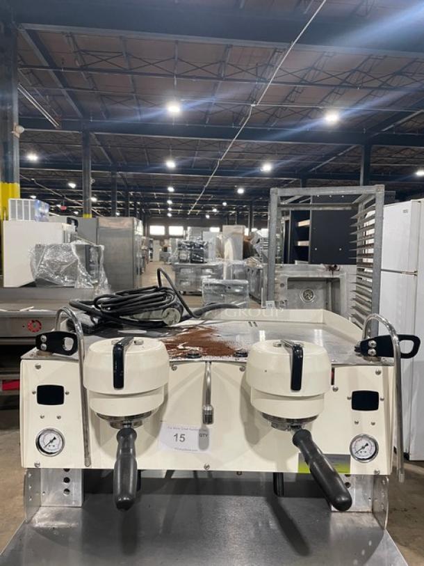 Synesso S200 Series, white, electric powered, two-group espresso machine with steam wand, visible dials.