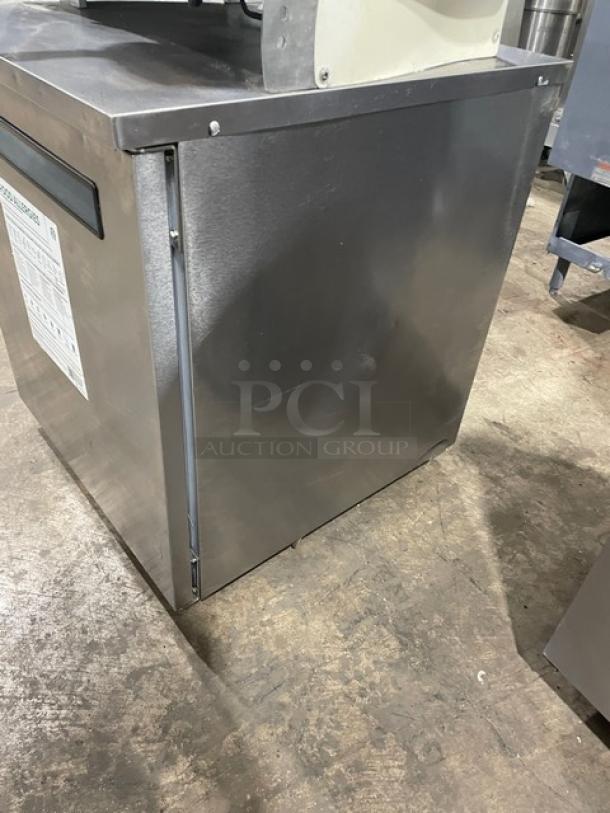 Delfield 406P-STAR2 stainless steel undercounter refrigerator, single door, commercial-grade, on casters, 115V, good condition.