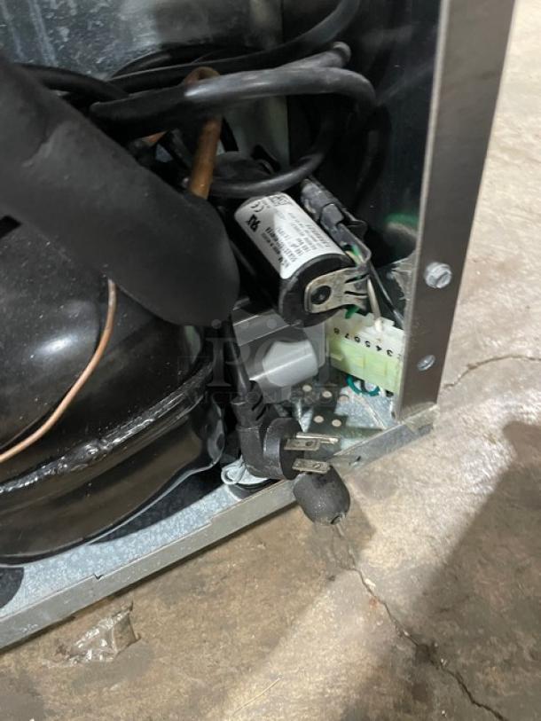 Delfield 406P-STAR2 undercounter refrigerator components, showing wiring and compressor detail. Condition appears used.