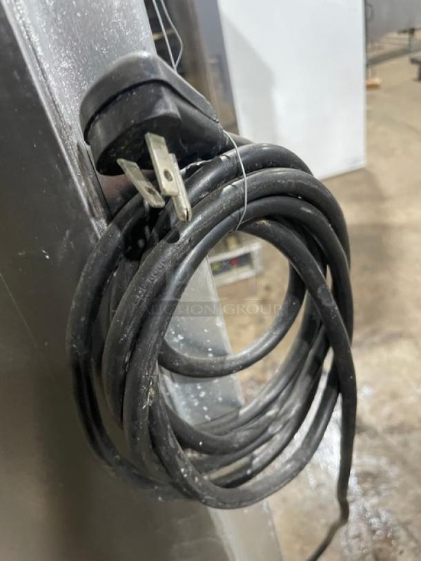 Coiled power cord of Glastender MVF24GNL mug chiller. 2018 model, stainless steel, single glass door, 120V 1-phase.