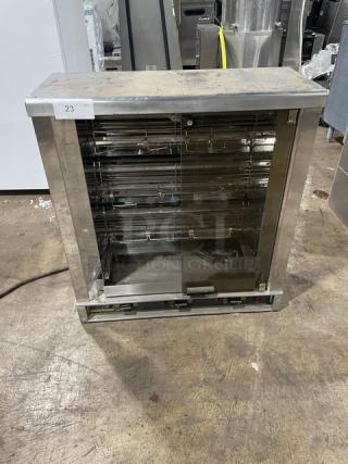 Robot Coupe stainless steel electric countertop rotisserie cabinet with visible control panel and legs, commercial use.