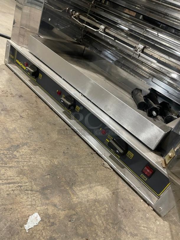 Robot Coupe stainless steel electric rotisserie cabinet, countertop model with control panel, legs, and robust construction.