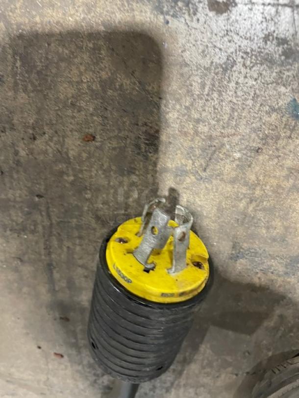 Robot Coupe rotisserie cabinet power plug, yellow and black, showcasing commercial-grade durability for electric connection.