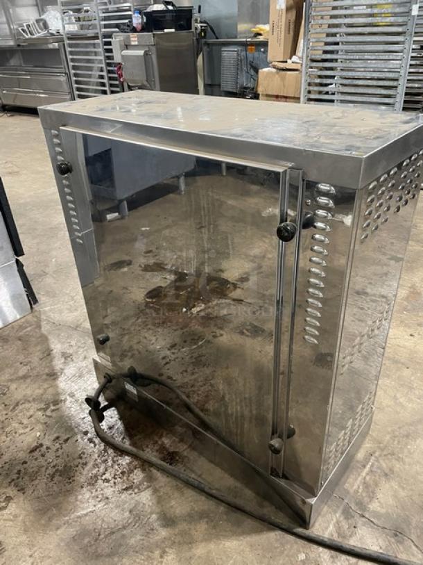 Robot Coupe commercial stainless steel electric rotisserie cabinet with legs, in used condition, countertop model.