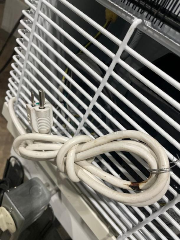 Accucold ARS6PV Pharma-Vac refrigerator, back view with white power cord and poly coated racks, medical-grade, 110V.