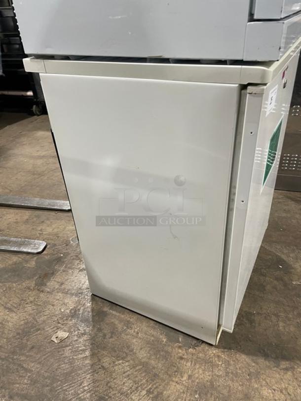Fisher Scientific Model 97-938-1 white undercounter flammable storage unit, features poly coated wired rack, single door, 120V, minor scuffs.