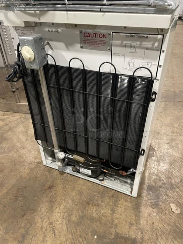 Fisher Scientific undercounter flammable storage unit, model 979381, with poly-coated wire rack and caution label, 120V, 1 phase.