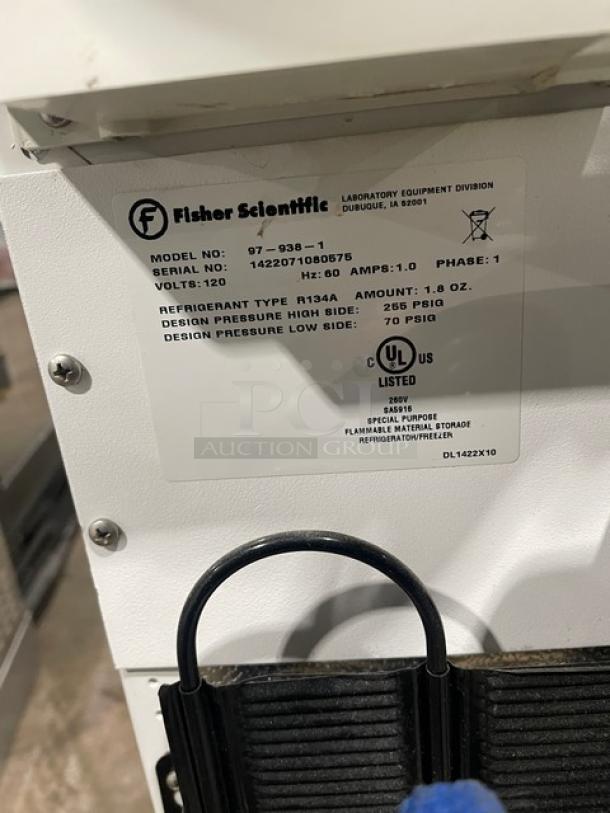 Fisher Scientific white undercounter flammable storage unit, Model 97-938-1. Includes poly-coated wire rack. 120V, 1 Phase.