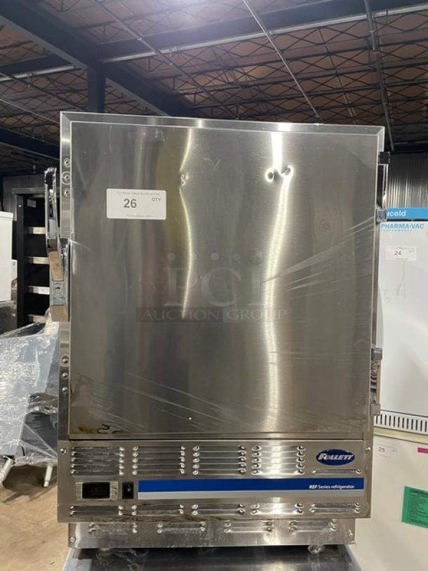 Follett REF5 stainless steel undercounter medical-grade refrigerator with solid single door, includes poly-coated wired rack, excellent condition.