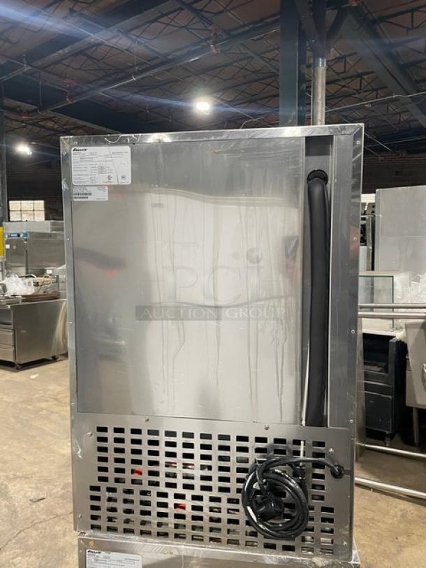 Follett REF5 commercial stainless steel medical-grade undercounter refrigerator, single door, poly coated wired rack, model REF5, SN: E14055-27213, 115V 1 phase.