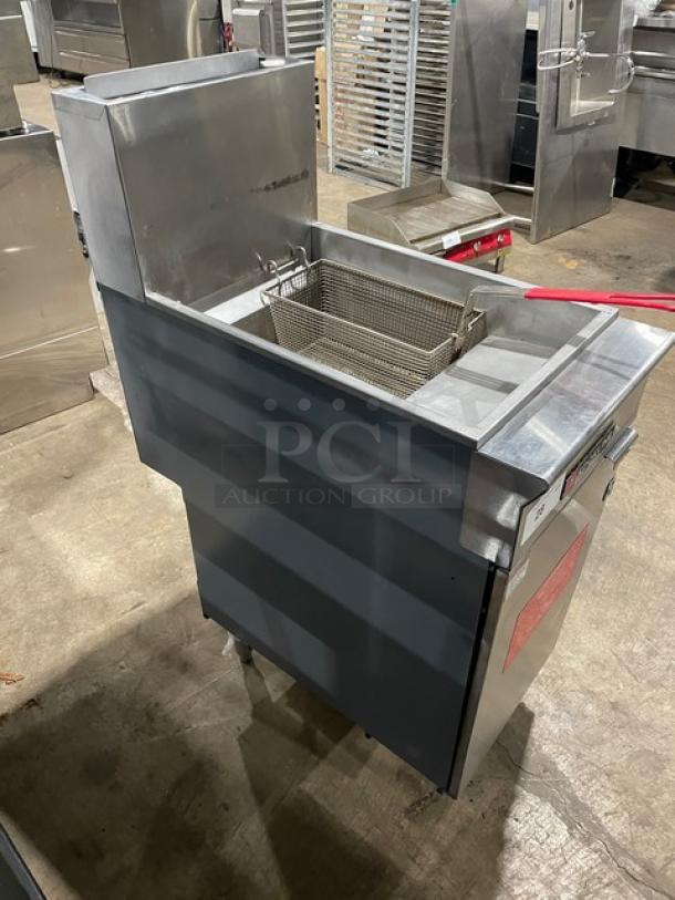 Cookline commercial stainless steel gas deep fryer with backsplash, fry basket, and legs. Good condition. Ideal for restaurants.