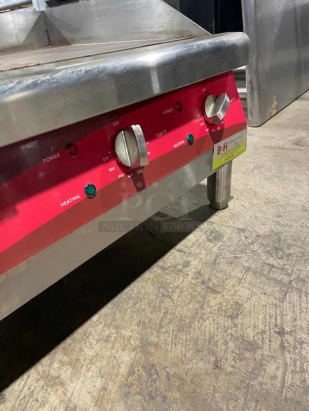 Avantco 177EG24N Commercial 24" Stainless Steel Flat Griddle, Electric, with back & side splash, on legs, 208/240V.