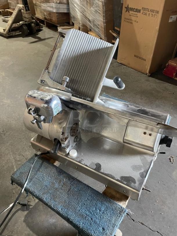 Globe Model 500 electric deli meat slicer, commercial countertop design, 1 phase, metal finish, mounted on legs.