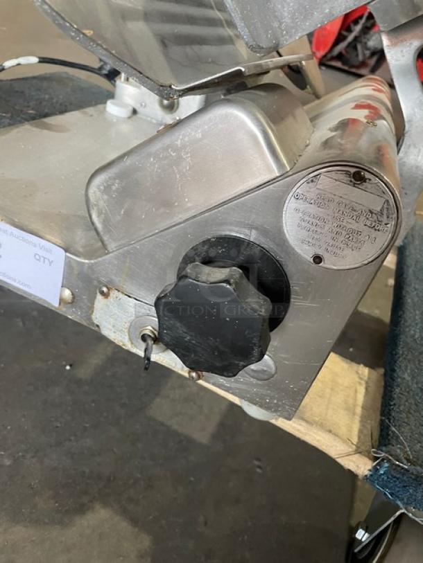 Globe Commercial Electric Deli Slicer, Model 500, 1 Phase, on Legs. Visible label for operation and safety instructions.