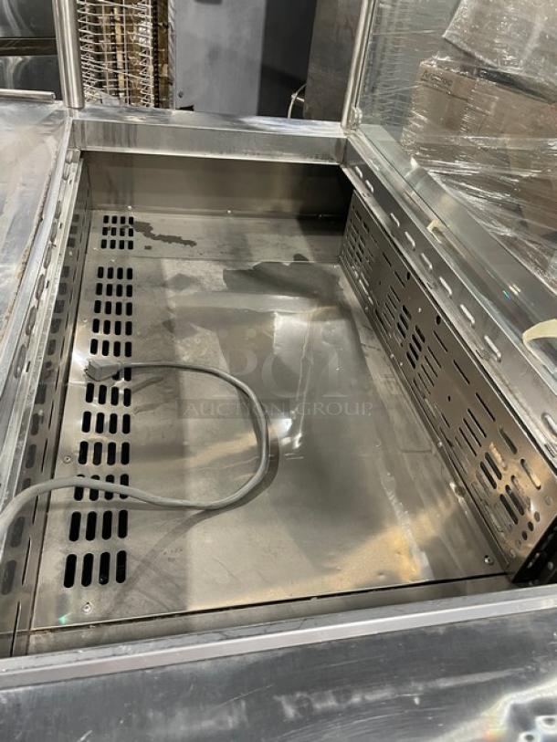 Turbo Air M3 MST-48-18 stainless steel refrigerated prep table with sneeze guard, 2 doors, on casters, 115V, excellent condition.