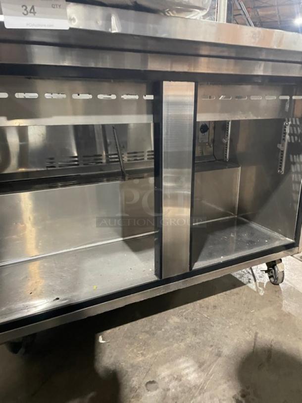 Turbo Air M3 Series stainless steel 2-door refrigerated prep table, model MST-48-18, with sneeze guard and casters.