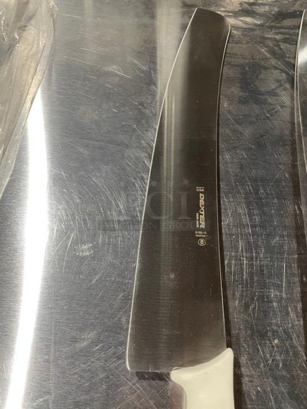 Dexter Russell Sani-Safe 18” pizza knife, model S160-18, stainless steel blade with white grip handle, new condition.