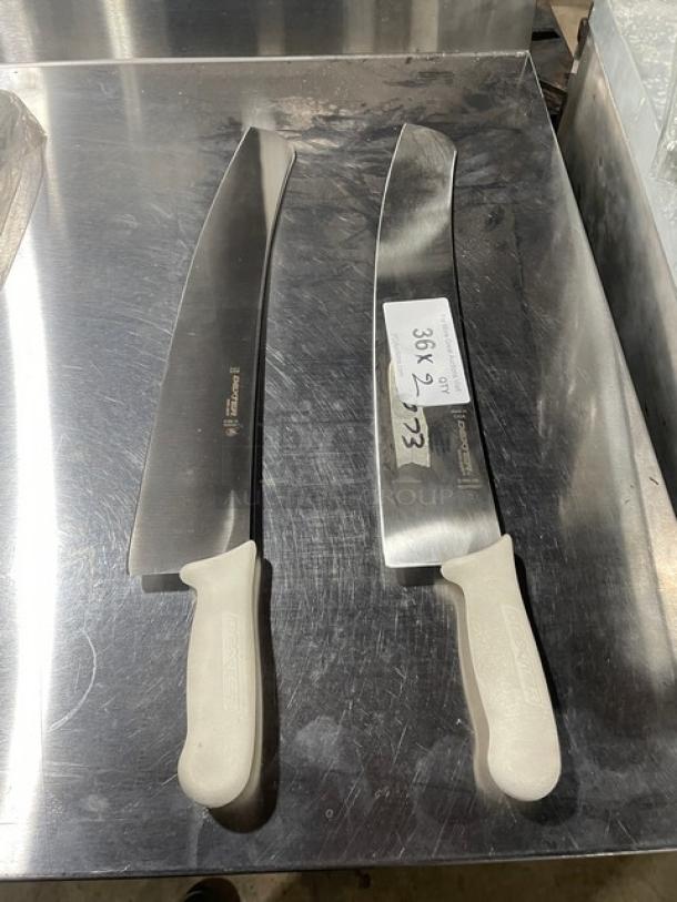 Dexter Russell Sani-Safe 18” pizza knife, model S160-18, with white grip handle. New condition, stainless steel blade.