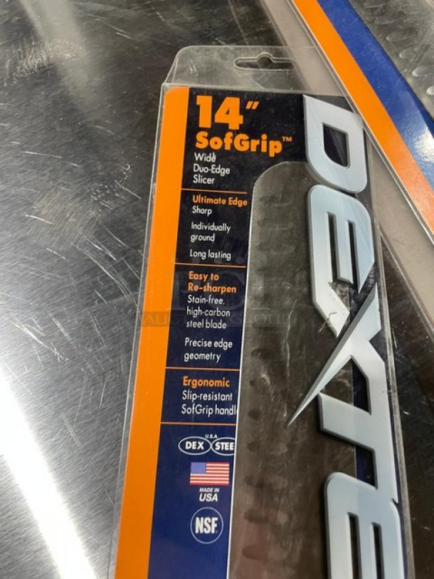 Dexter Russell SG140-14WGE-PCP 14" Wide Duo-Edge Slicer, stainless steel, white SofGrip handle, in packaging with features listed.