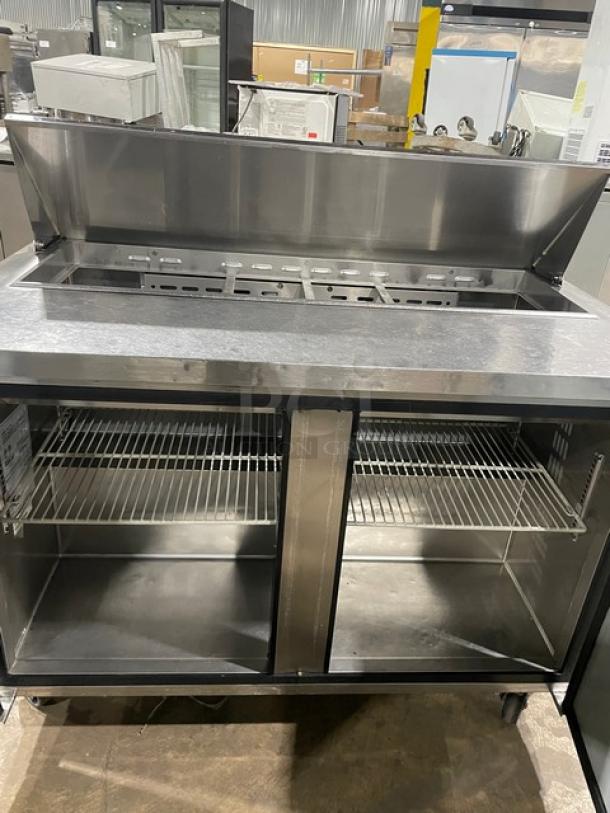 Turbo Air MST-48-N refrigerated prep table, stainless steel, 2-door, poly-coated wired racks, on casters, 115V.