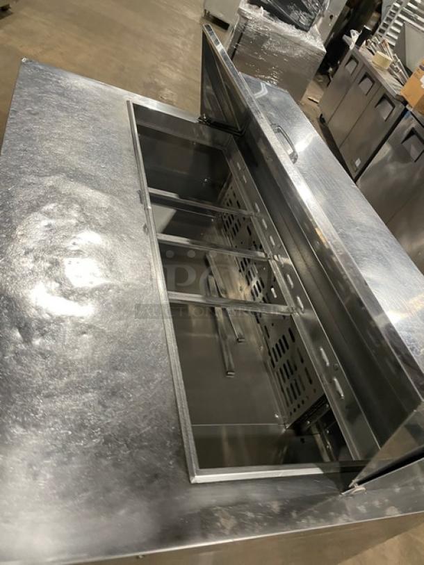 Turbo Air MST-48-N refrigerated prep table, stainless steel, 2 doors, poly-coated rack, on casters, 115V.
