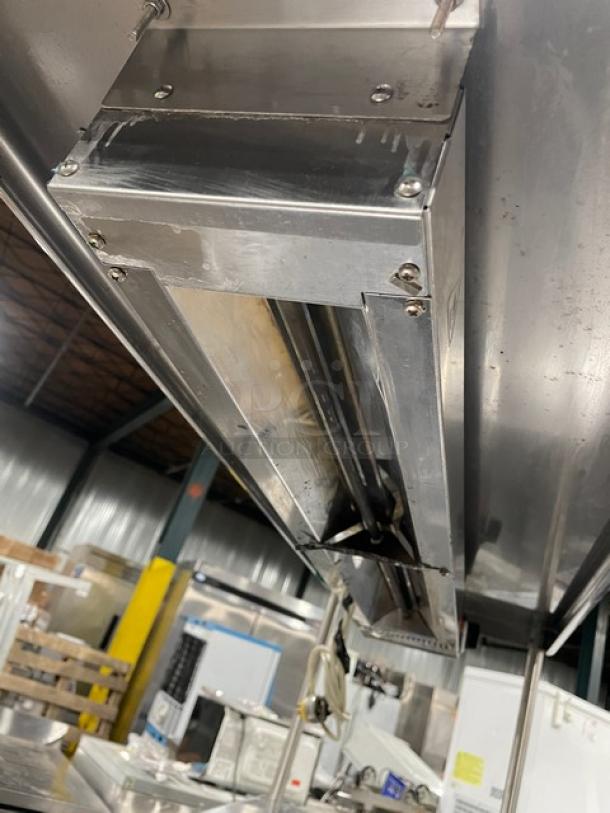 True Commercial Stainless Steel 2 Door Worktop Refrigerator, Model TUC-48, features double overhead shelf, Avantco heat lamp, poly coated wired rack, on casters, Energy Star certified, SN: 7804002, 115V.