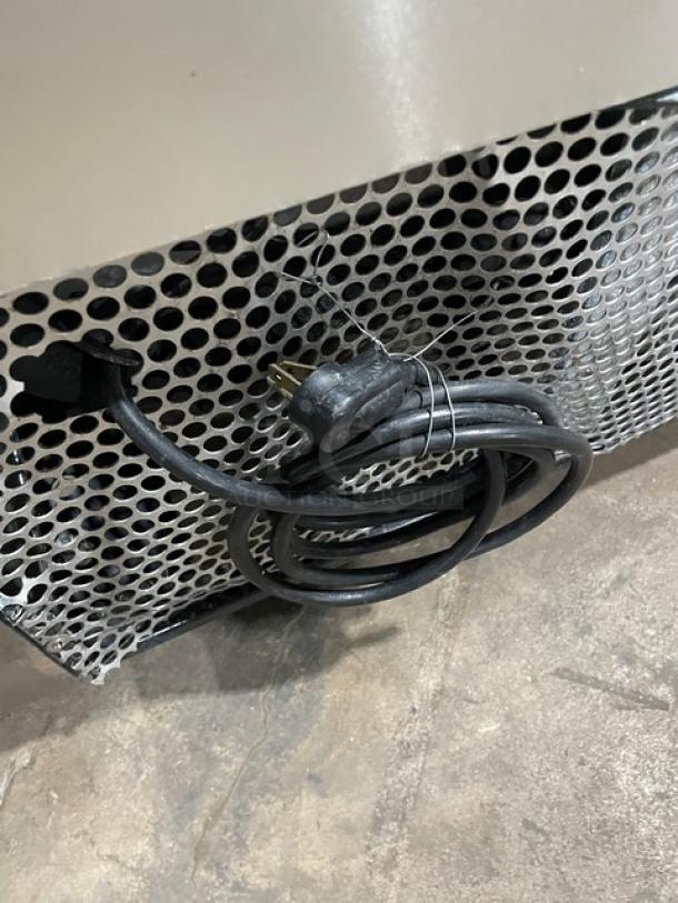 True Commercial Stainless Steel 2 Door 48" Worktop Refrigerator with power cord; Model: TUC-48; 115V; on casters.