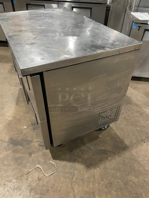 True TUC-48D-4 stainless steel 4-drawer undercounter worktop refrigerator on casters, good condition.