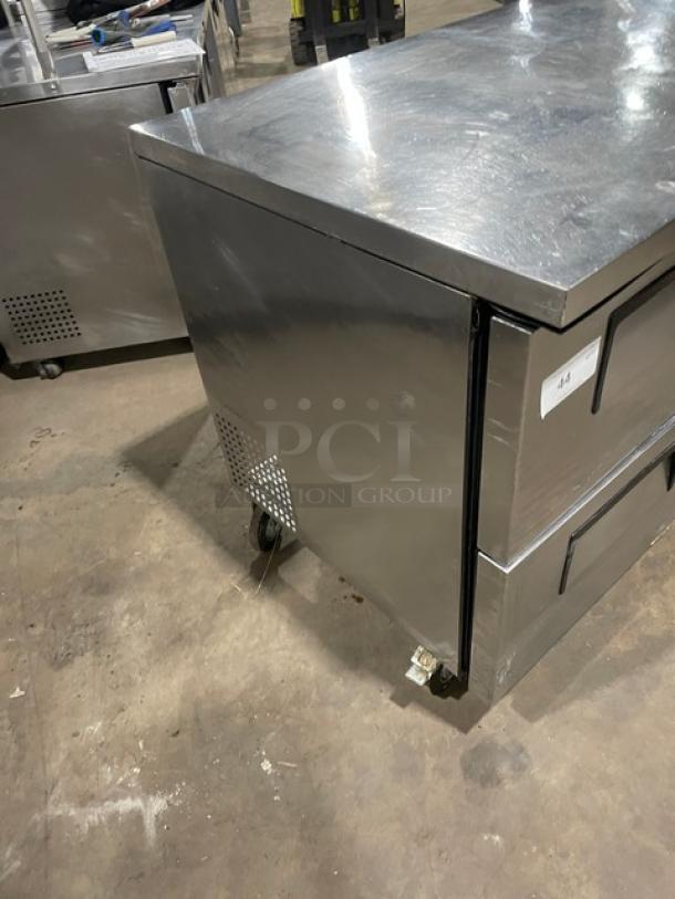 True TUC-48D-4 commercial stainless steel 4-drawer undercounter refrigerator on casters, model TUC48D4, in good condition.