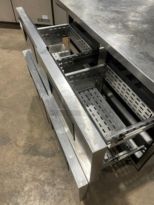 True TUC-48D-4 stainless steel 4-drawer undercounter refrigerator on casters; excellent condition, 115V, 1 phase.