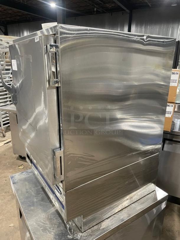 Follett REF5 medical-grade undercounter refrigerator with stainless steel finish, single solid door, poly-coated wire rack, 115V, good condition.