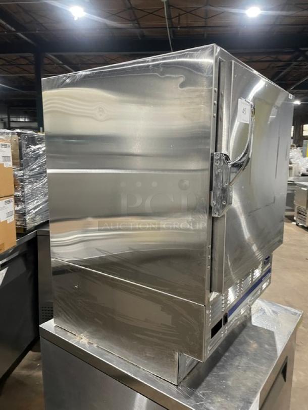 Follett REF5 medical-grade undercounter refrigerator, stainless steel, single door, poly-coated rack, model REF5, SN: E14011-27113.