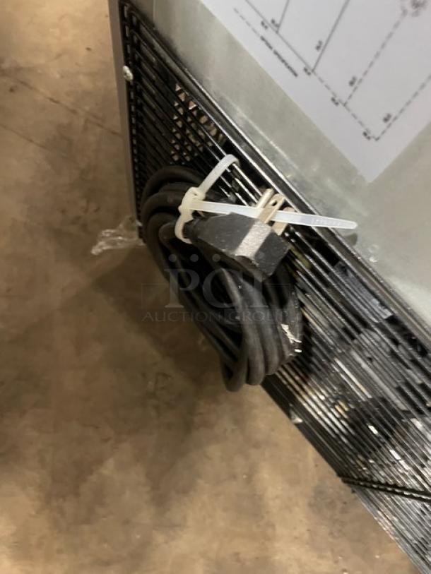 Turbo Air M3 Series MUR-28 stainless steel undercounter refrigerator, poly-coated rack, 115V, on casters, power cord visible.